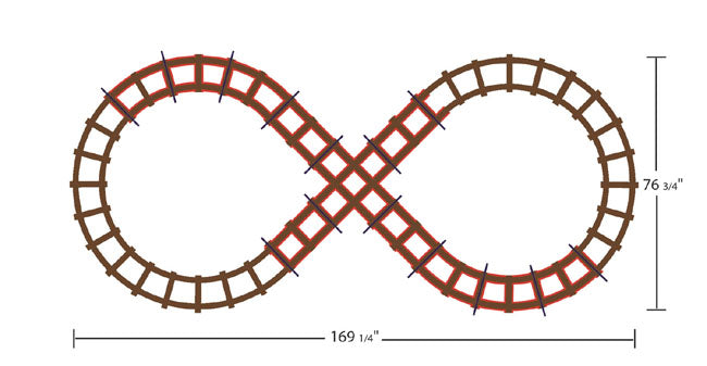 Overhead view of a charcoal figure 8 model train track with curved, straight, and intersection pieces forming an infinity loop