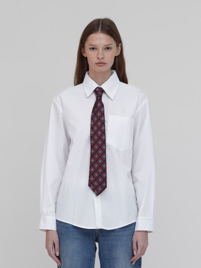 women wearing a white shirt and tie one dna
