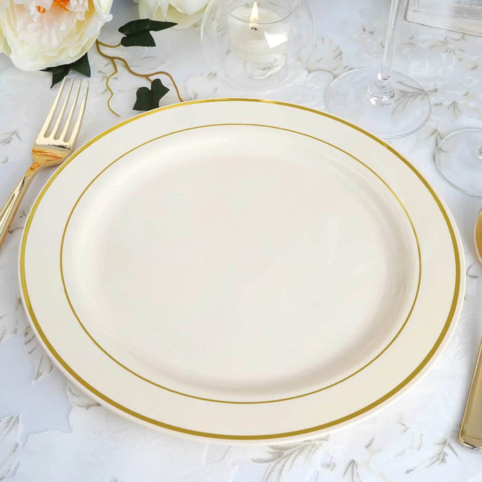 Elegant white plate with gold trim on a textured table setting.