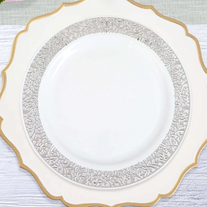 Elegant white plate with intricate silver floral rim design.