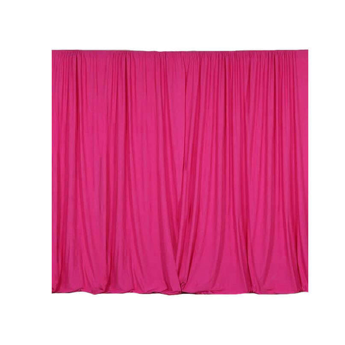 Pink stage curtain draped elegantly, perfect for events or performances.
