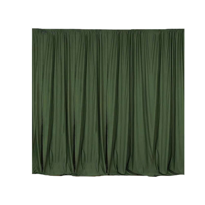 Green fabric backdrop curtain draped elegantly.
