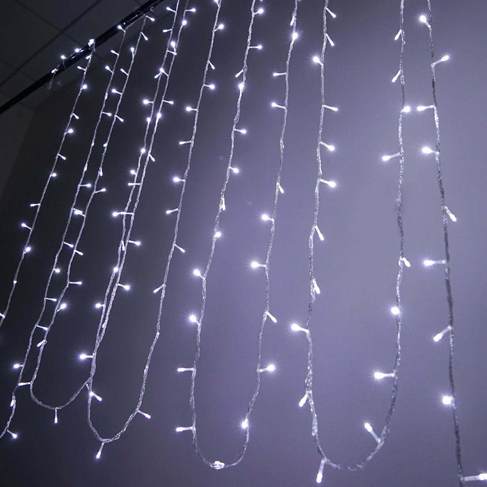 White string lights hanging on a wall for decorative lighting.