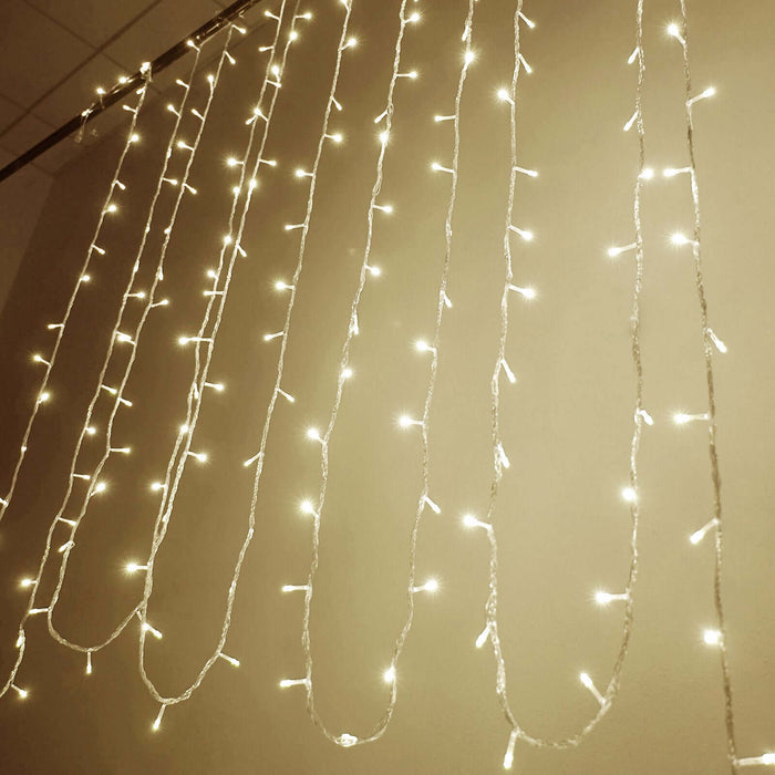 Decorative string lights hanging on a wall. #whtbkgd