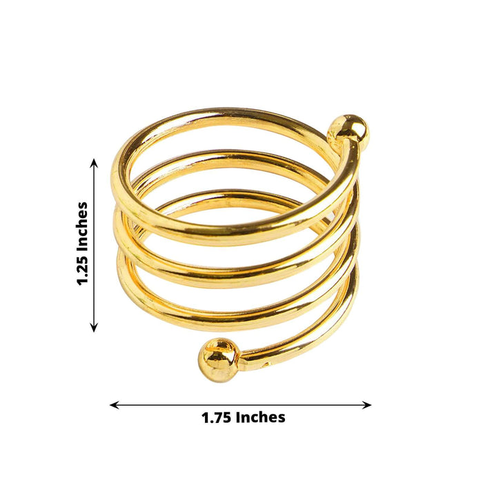 Gold spiral ring with measurements, 1.25 inches height and 1.75 inches diameter.