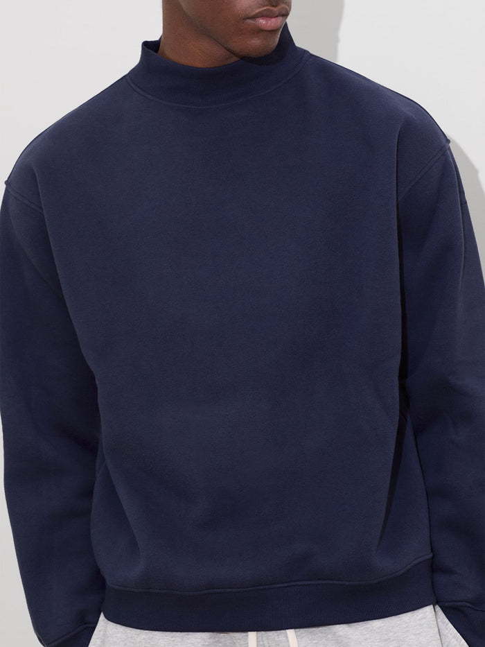 detail of mens mock neck sweatshirt navy one dna
