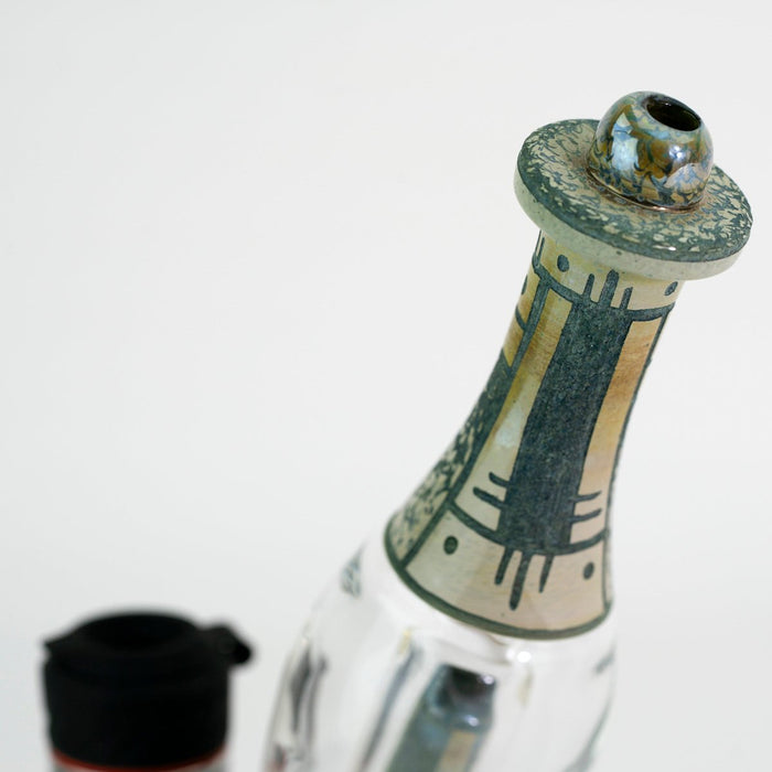 Closeup top of glass water peak attachment on white background