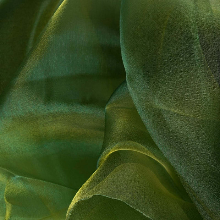 Green sheer fabric with soft, flowing texture and subtle gradient. #whtbkgd
