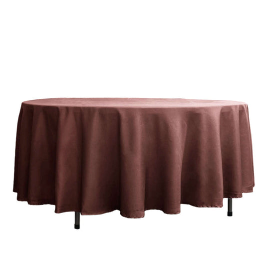 Brown round tablecloth on a white backdrop
