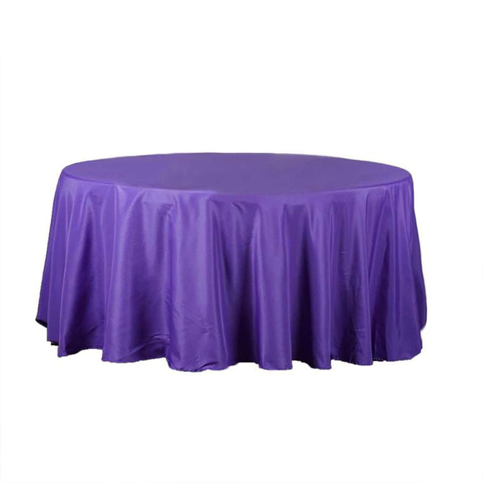 Purple round tablecloth on a plain background
