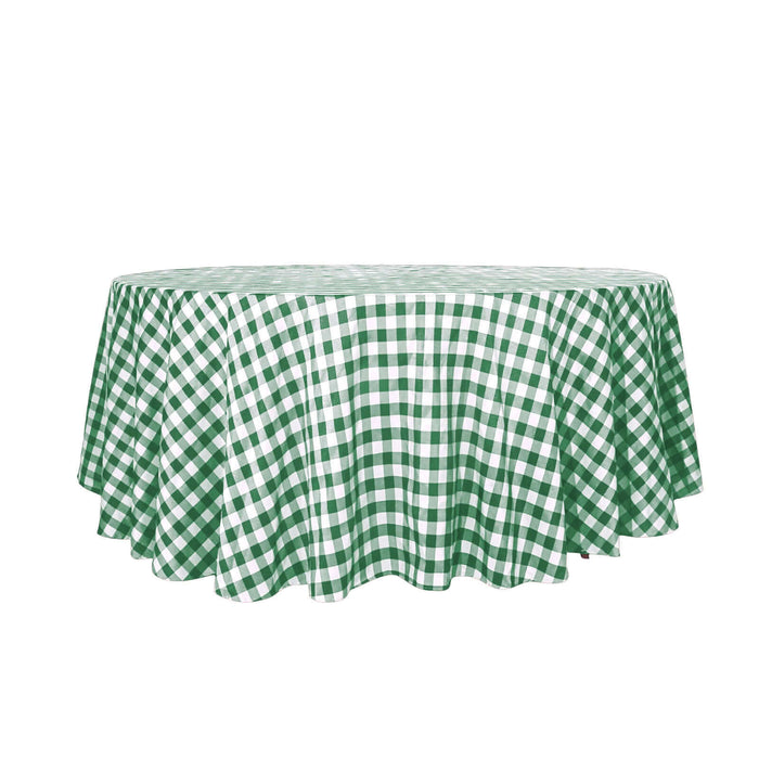 Green and white gingham tablecloth on a round table