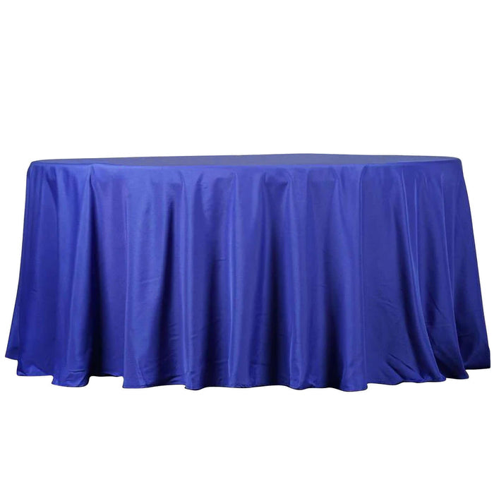 Blue tablecloth draping over a round table.