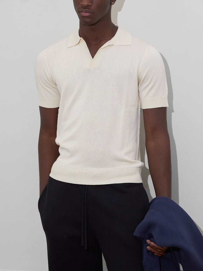 male model wears rodeo polo cream one dna