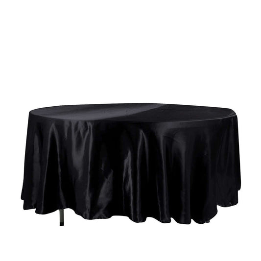 Black round tablecloth on a plain white background.