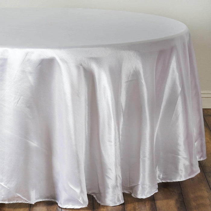 Round satin tablecloth in soft silver color.