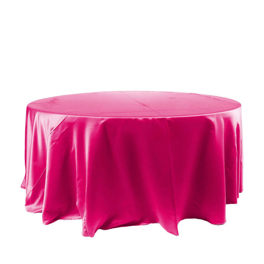 Round pink tablecloth draped elegantly over a table