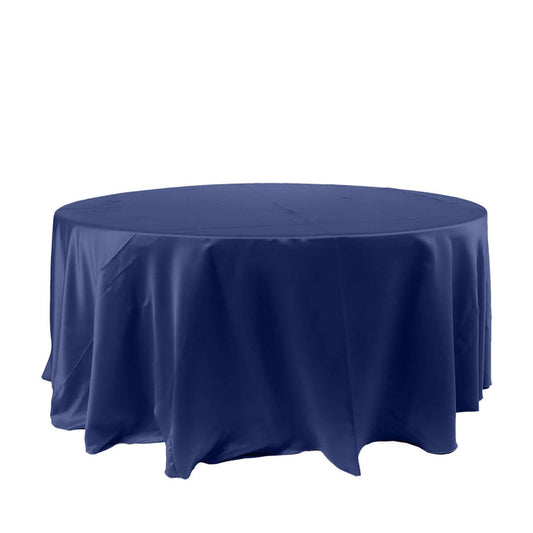 Navy round tablecloth with elegant draping on a white background