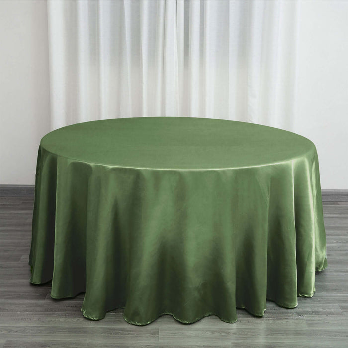 Green satin round tablecloth with elegant draping.