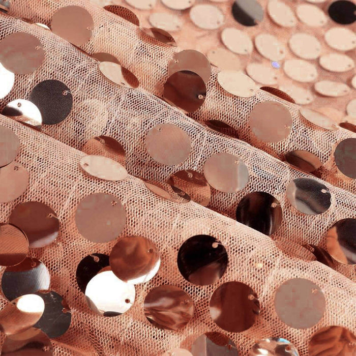 Rose gold sequin fabric with shimmering circular sequins. #whtbkgd