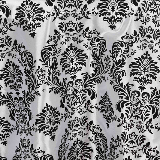 Black and silver damask fabric texture with elegant floral design. #whtbkgd