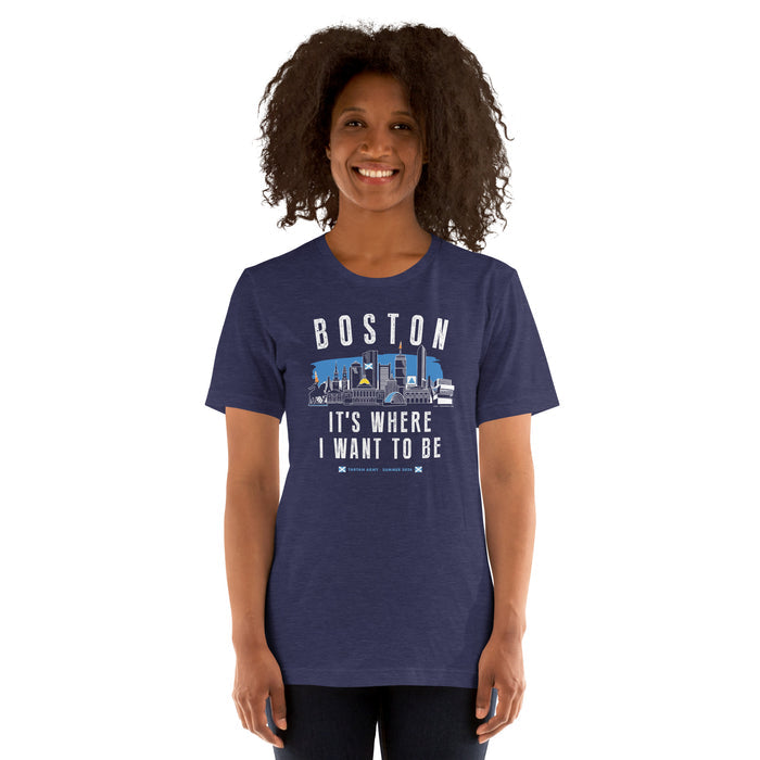Woman wearing a navy blue t-shirt with 'Boston' text and graphic on a white background Navy blue t-shirt with 'Boston It's Where I Want to Be' design on a hanger and tartan army