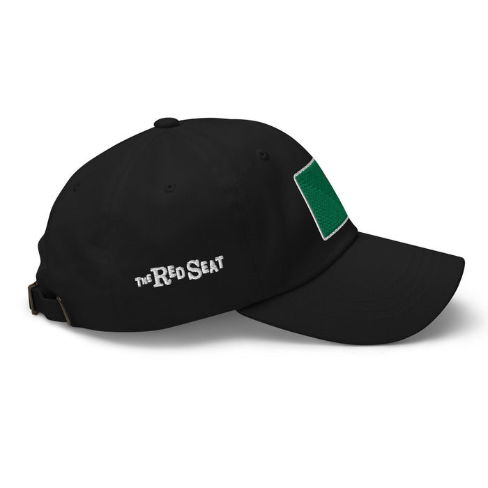 photo of a side view of a black baseball cap with fenway park's red seat embroidered on the front in green and red.