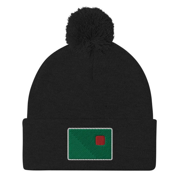 photo of a black pom pom beanie with the red seat logo in green and red embroidered on the cuff