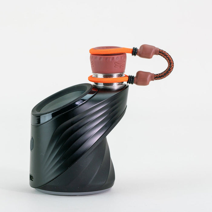 Orange tuff tether puffco pro attachment on white background
