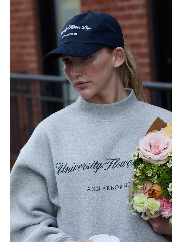 university flower shop mock neck sweatshirt and dad hat